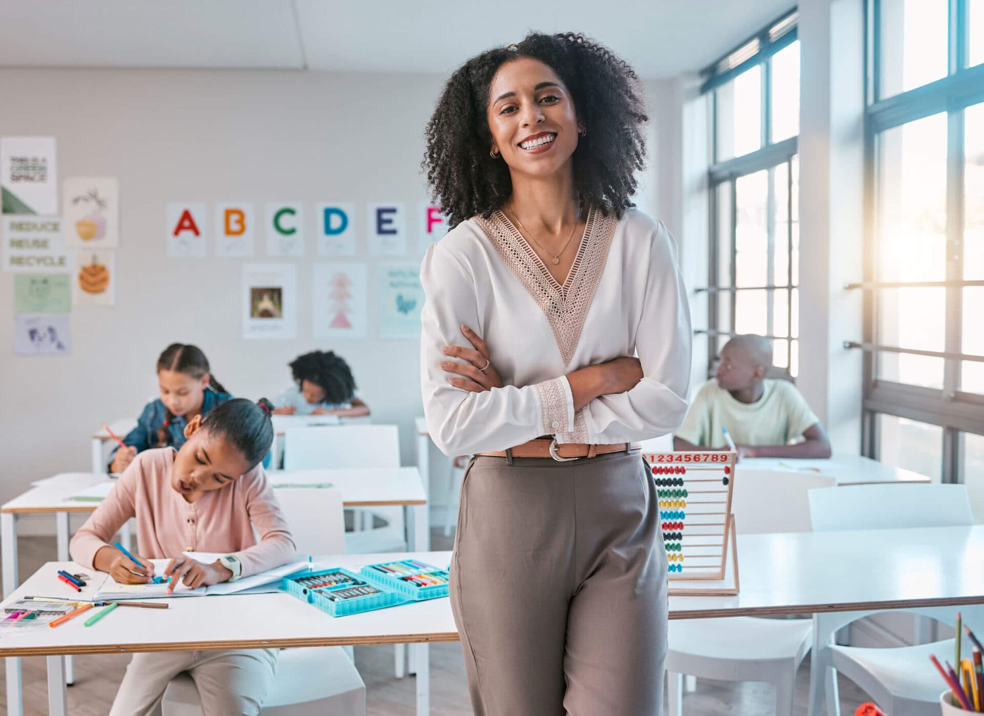 A Virginia Early Learning Academies teacher standing in her classroom